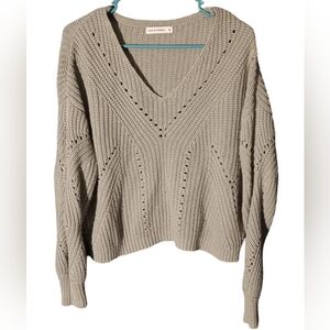 green knitted long sleeve top